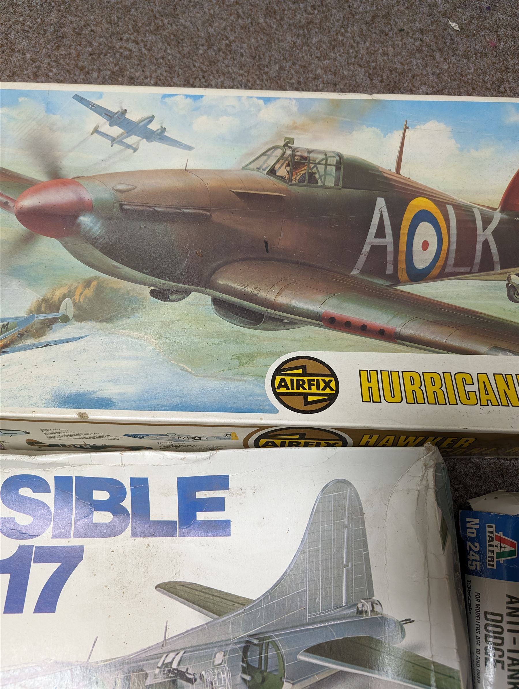 Three model kits, including Airfix Hawker Hurricane MK1 1:24 scale, Italeri Anti Tank Dodge 1:35 scale and Monogram Visible B-17 1:48 scale, all boxed 