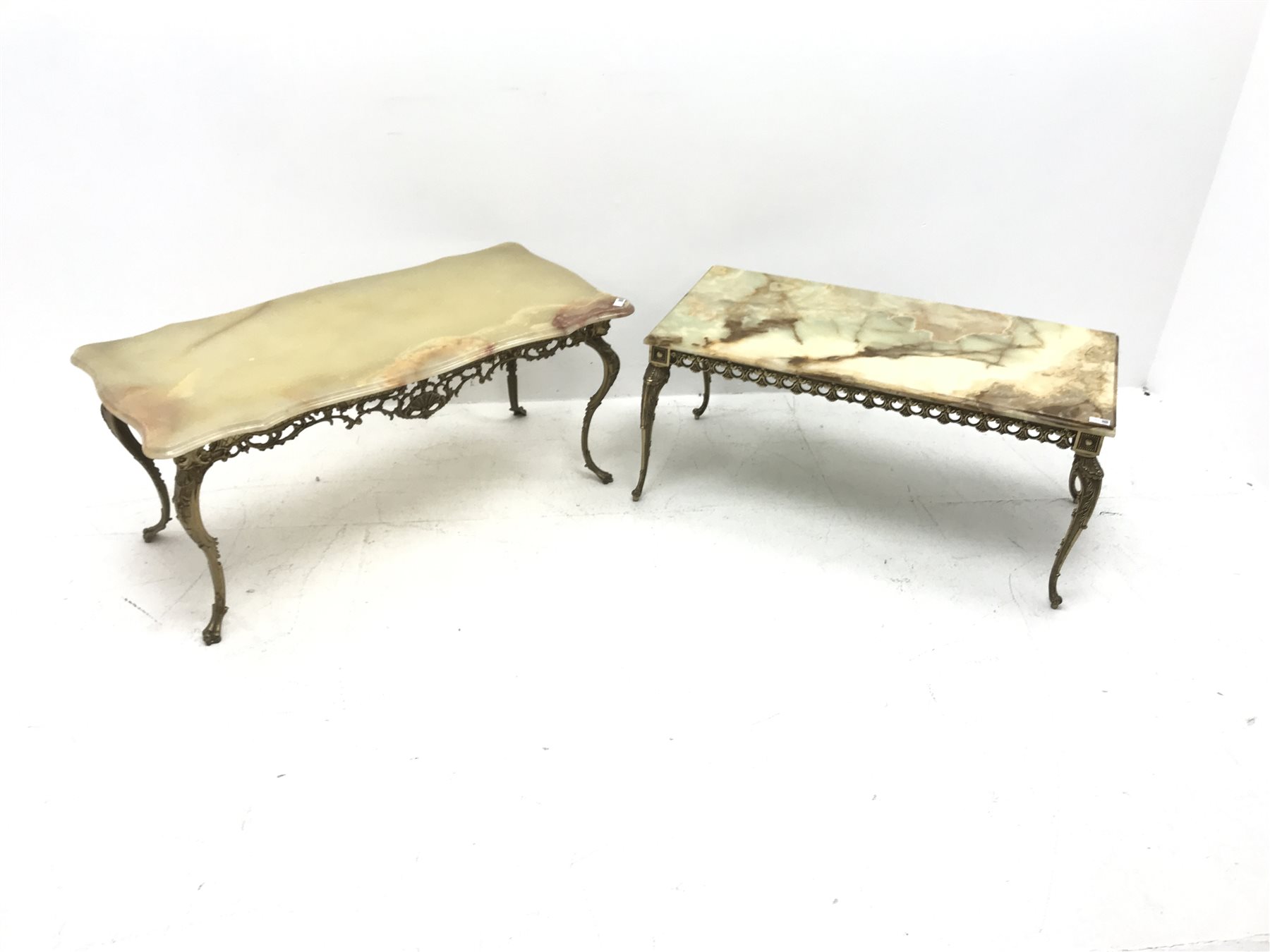 Two vintage onyx coffee tables on ornate gilt metal bases, shaped top table - 111cm x 52cm, H50cm, rectangular top table - 101cm x 50cm, H45cm