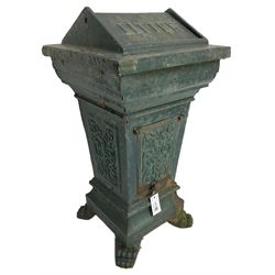 Early 20th century cast iron litter bin, square tapering form with scrolling foliate decoration, on paw feet