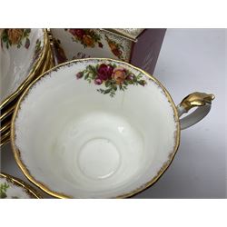 Royal Albert Old Country Roses pattern coffee service for six, comprising coffee pot, milk jug, cups and saucers, cake plate, together with miniature teapot, six teacups and saucers, six dinner plates, six side plates etc 