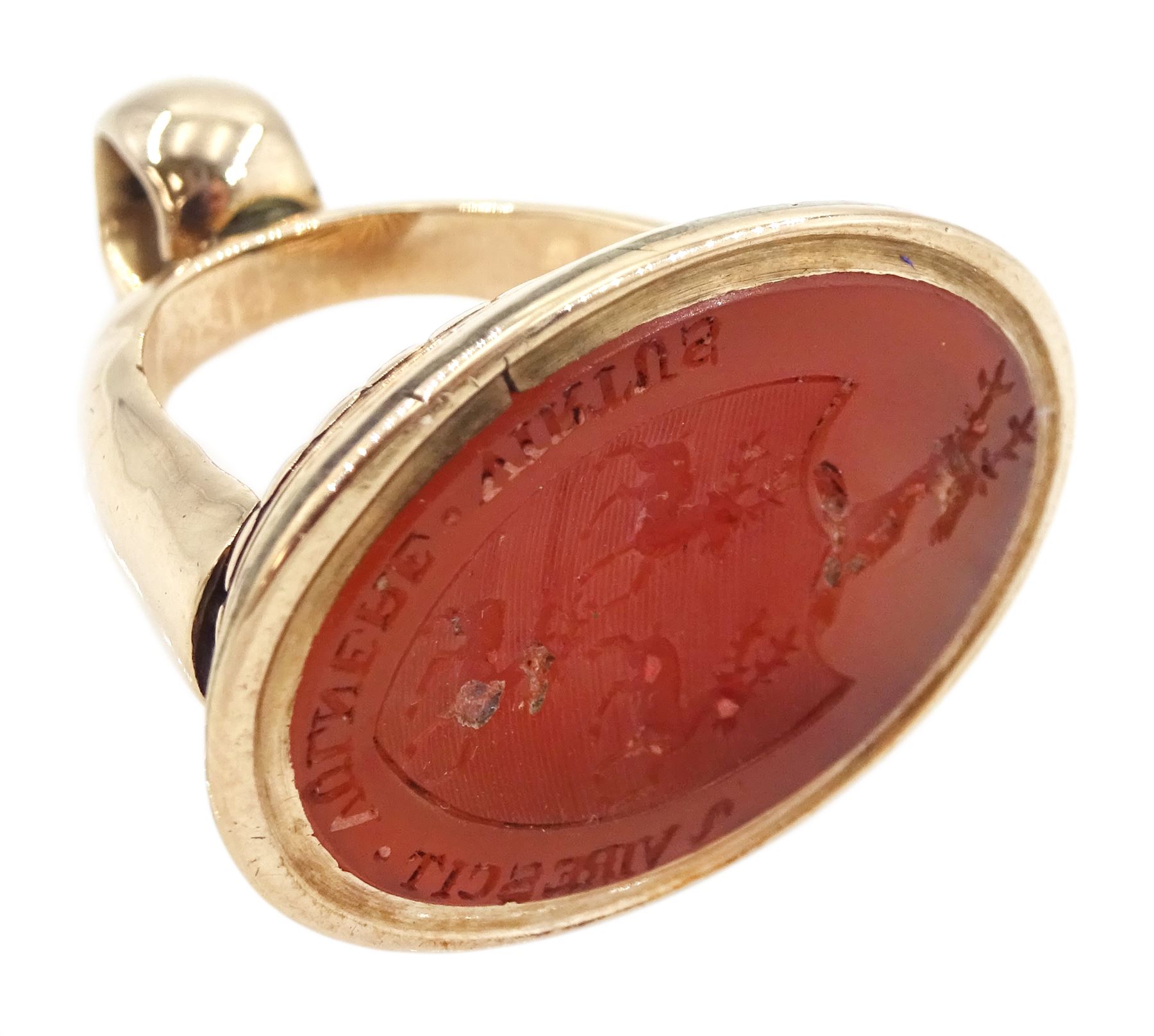 Large 19th century gold oval carnelian intaglio fob seal depicting three stags within a shield and mounted by a stag's head, engraved with the moto 'Virescit Vulnere Virtus'