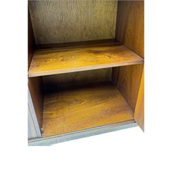 Georgian design mahogany bookcase on cupboard, projecting moulded and dentil cornice, two display cabinets enclosed by glazed doors above over three drawers and three cupboards, on bracket feet