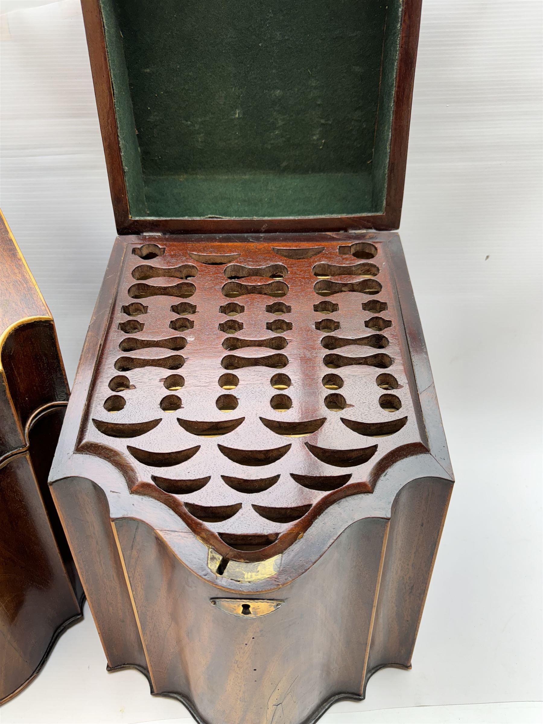 Pair of George III mahogany knife boxes, each of serpentine fronted form with strung detail to the hinged cover and body, opening to reveal a fitted interior, H38cm