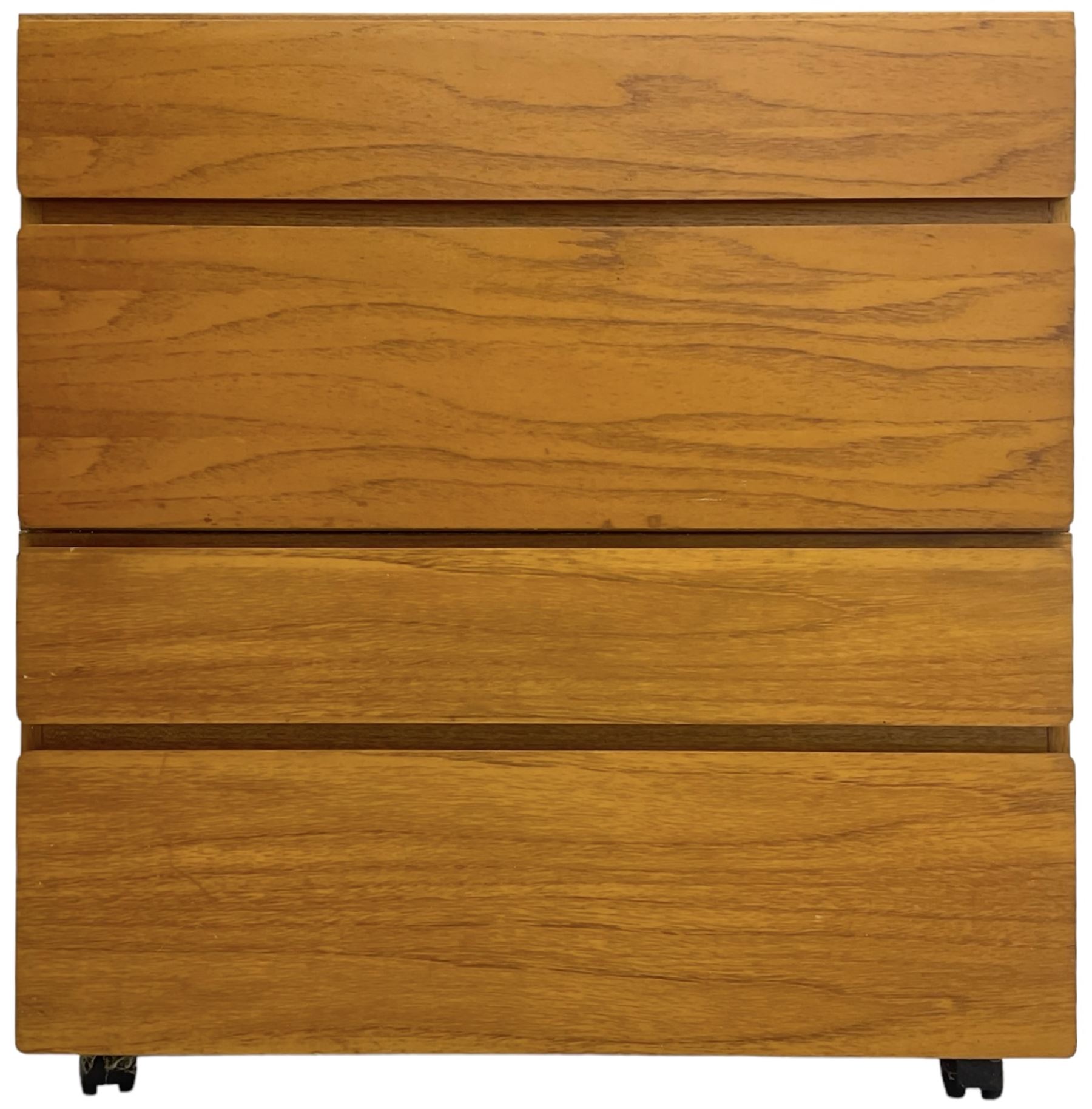 Mid-20th century teak four-drawer chest, featuring a minimalist design with two shallow and two deep flush drawer fronts, each with recessed handles along the top edge, the drawers open to reveal white laminate interiors, supported by castors