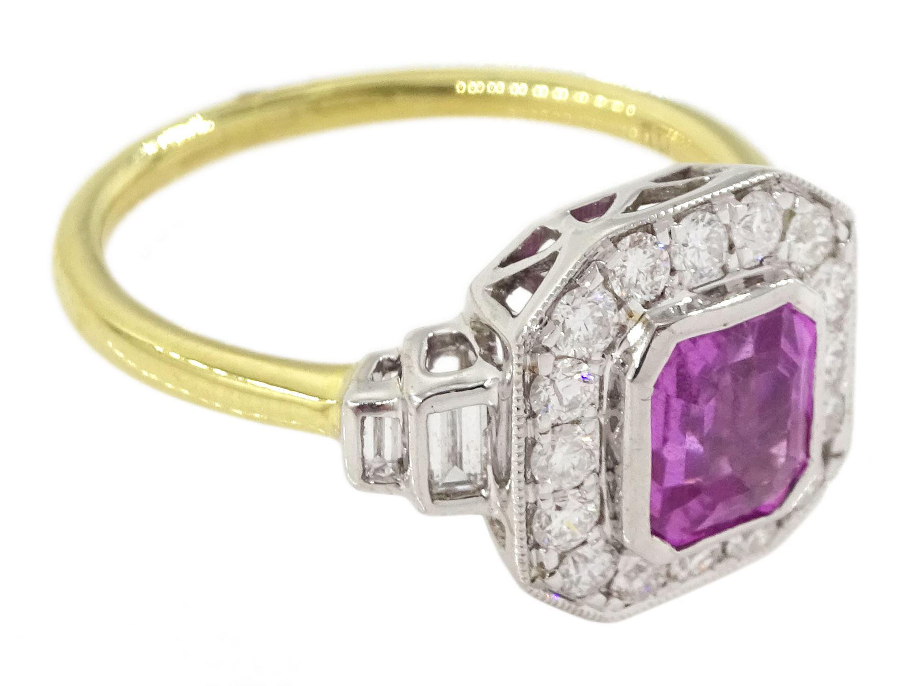 18ct white and yellow gold pink sapphire and diamond cluster ring, emerald cut sapphire, with milgrain set round brilliant cut diamond surround and baguette diamond shoulders, hallmarked, sapphire 1.30 carat, total diamond weight approx 0.50 carat