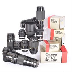 Canon F-1 SLR camera body serial no. 300461, boxed, together with thirteen Canon camera lenses, mostly FD, including 300mm 1:4 serial no. 18864, 100-300mm 1:5.6 serial no. 24187 and 200mm 1:2.8 serial no 16443, and three boxed FD extension tubes, some boxed