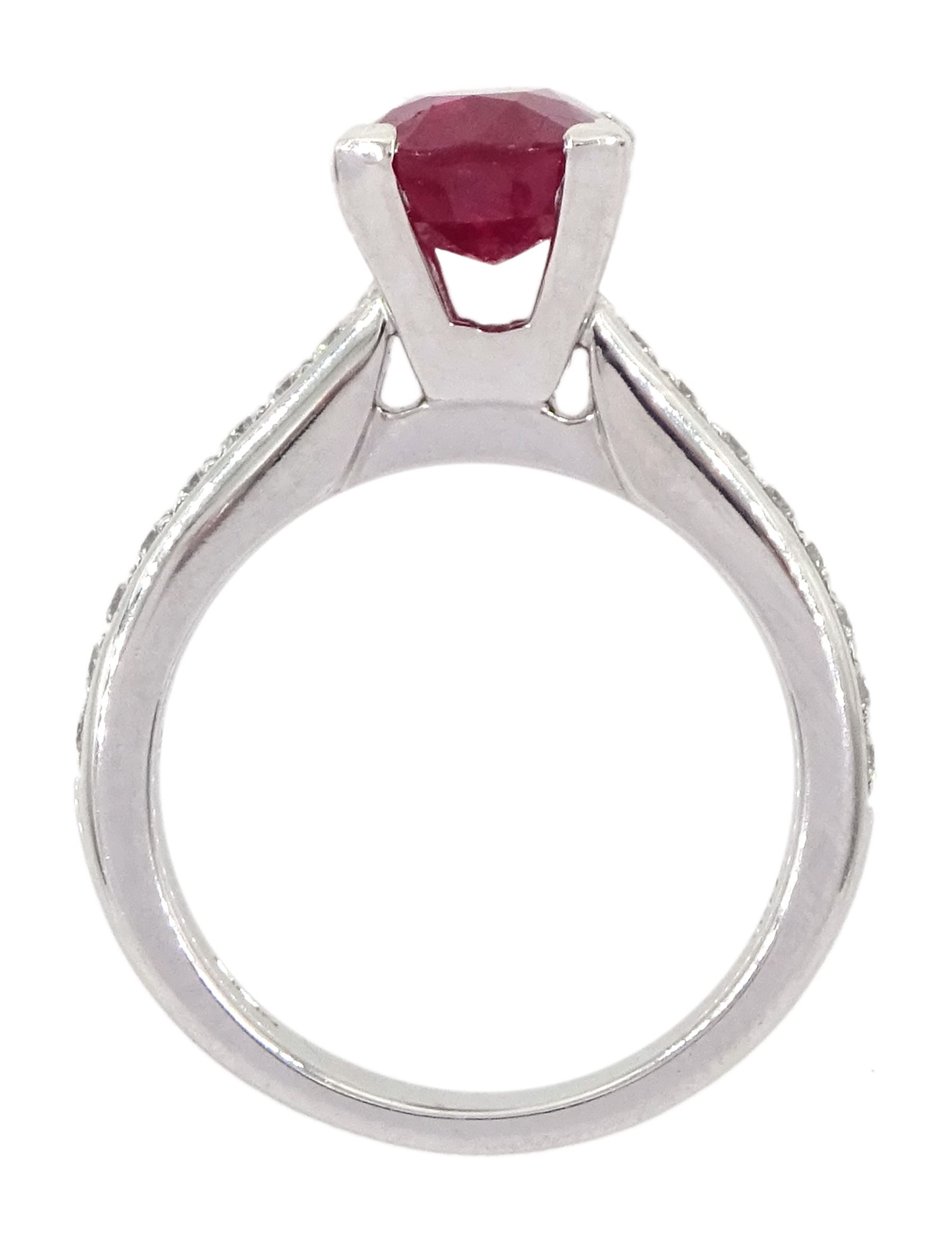 18ct white gold oval cut ruby ring, with channel set diamond shoulders, hallmarked, ruby approx 2.75 carat