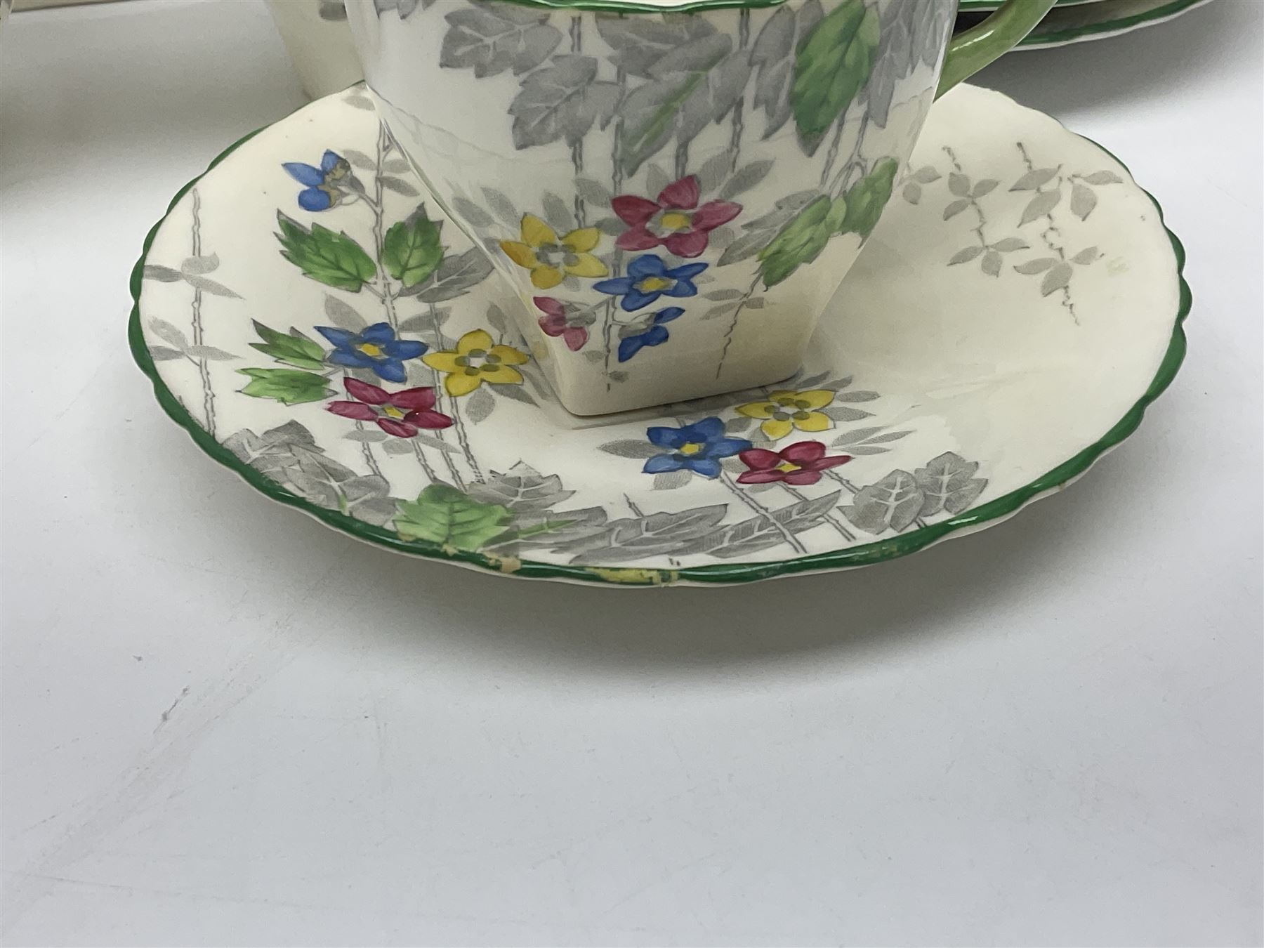 Art Deco Delphine China coffee service for six, comprising coffee pot, open sucrier, milk jug, cups and saucer, with floral decoration