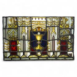 19th century leaded glass religious panel with a central chalice and various symbols 38cm x 61cm