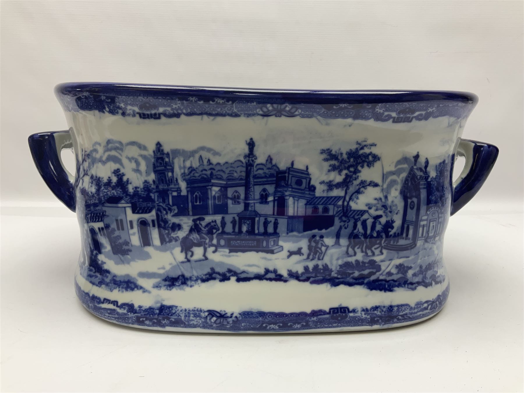 Victorian style, blue and white transfer printed footbath, decorated with town scene and with twin carry handles, L48cm