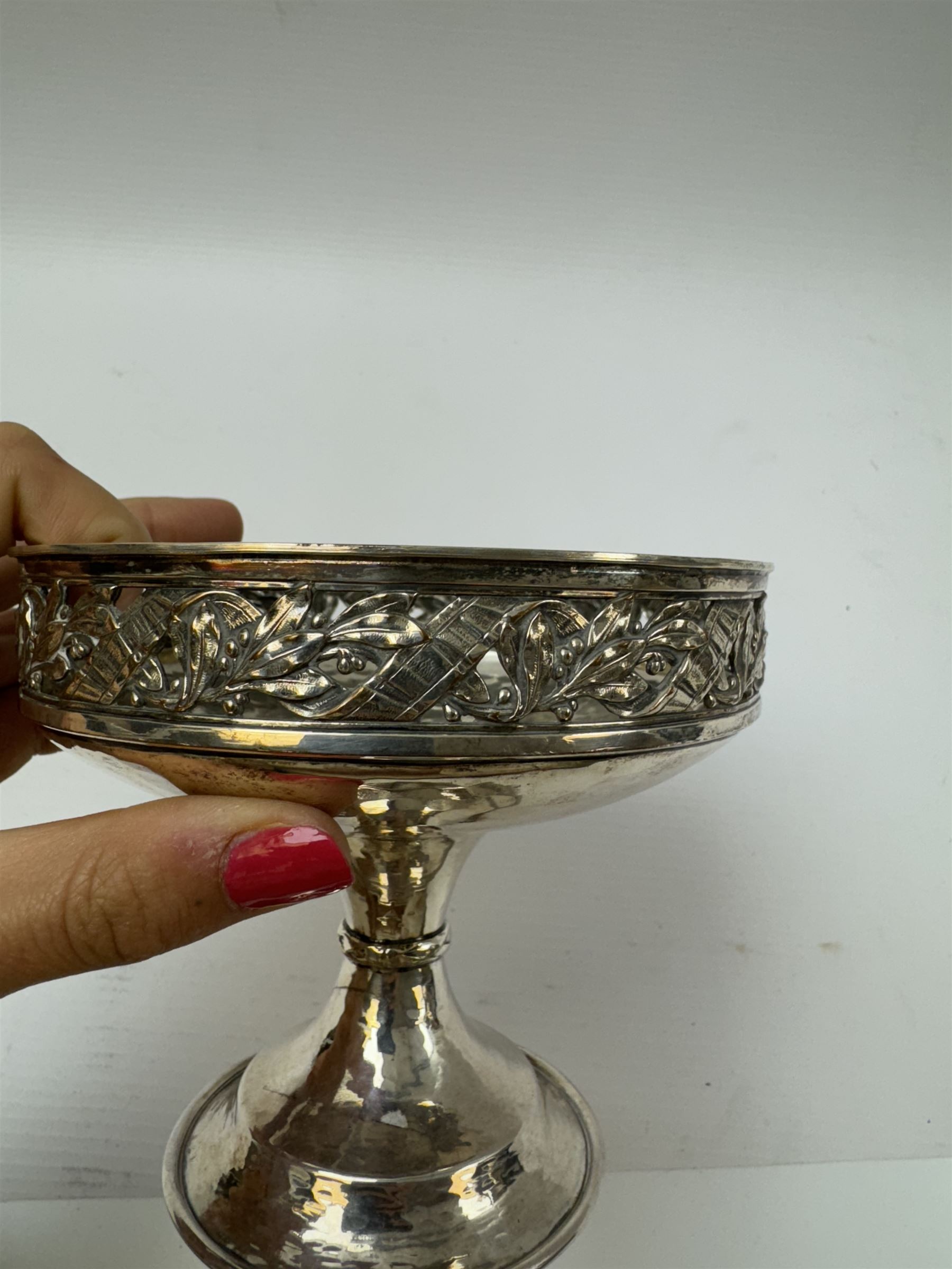 Arts & Crafts silver on copper pedestal dish, the circular bowl with hammered finish, and pierced foliate rim, upon a knopped stem, impressed 1665, H11cm