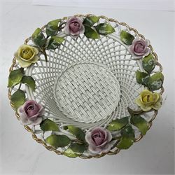 Pair of German Schierholz comports, with open weave baskets encrusted with roses, both with mark beneath, H15cm 