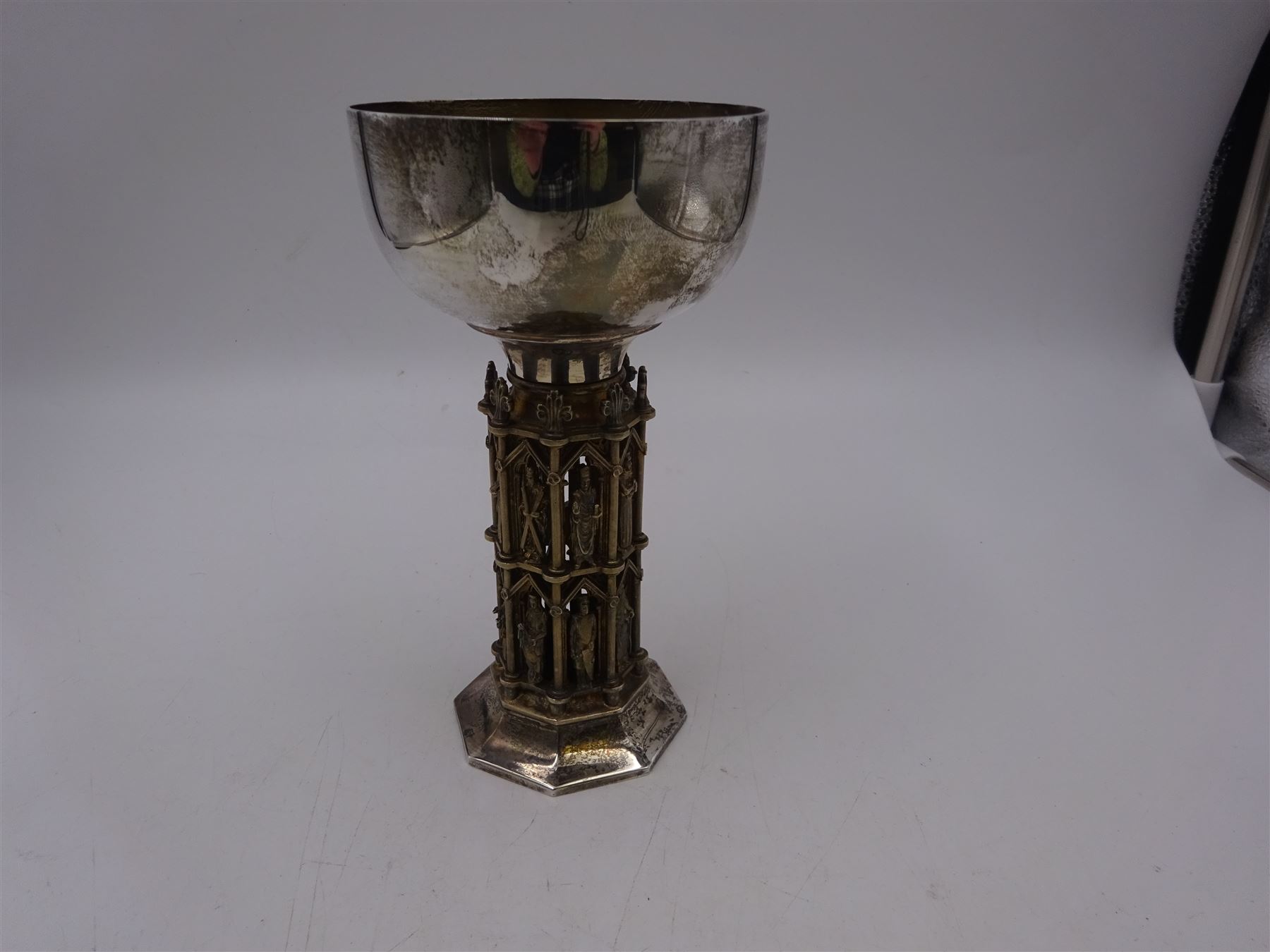 Modern limited edition silver goblet, 'made by order of The Dean and Chapter for the celebration of the eighth centenary of Wells Cathedral in 1982', designed by Hector Miller for Aurum, the plain circular bowl with parcel gilt interior, upon an ornate figural parcel gilt stem and an octagonal foot, no. 80/800, hallmarked Hector Miller, London 1982, H17cm