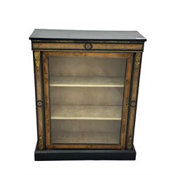 Victorian ebonised and walnut pier cabinet, rectangular top over figured frieze with central star motifs, enclosed by single glazed door, decorated with cast gilt metal mounts and beading, on chamfered plinth base 