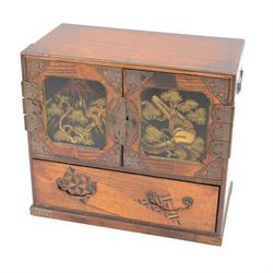 Mid 20th century Japanese mahogany jewellery box, the doors with embossed copper panels, w...