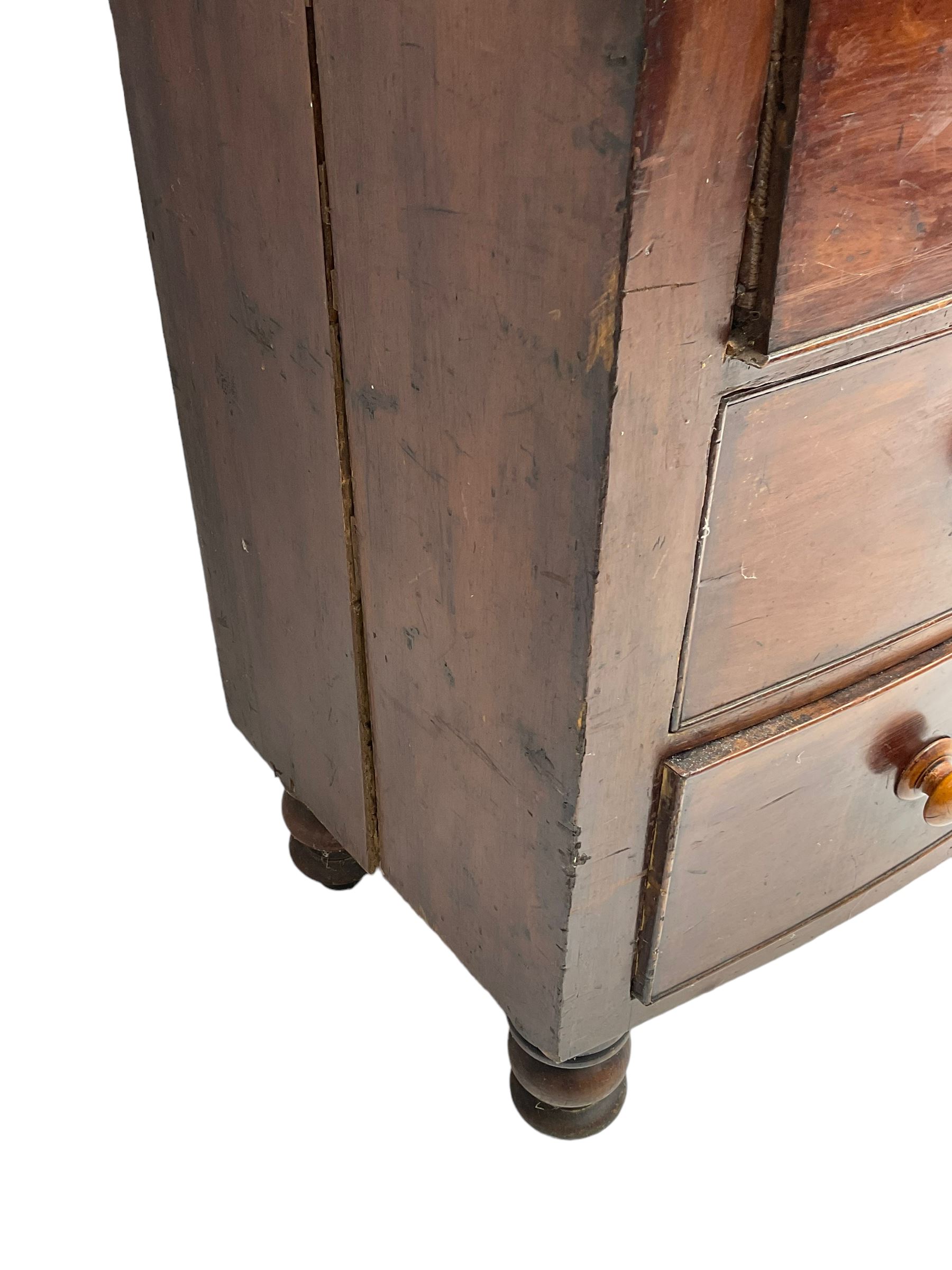 Victorian mahogany bow-front chest, fitted with two short and three long drawers, on turned feet