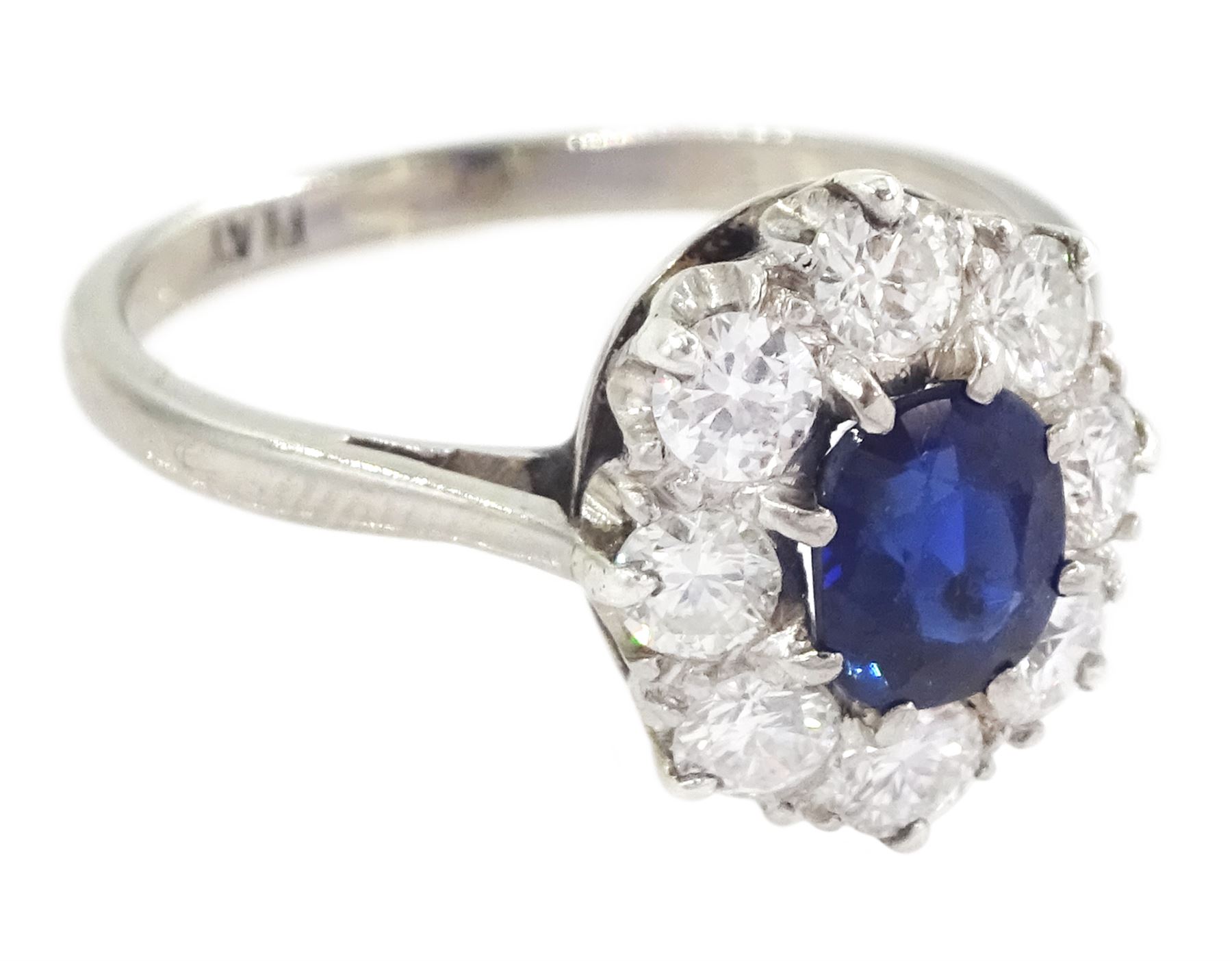 Platinum oval cut sapphire and transitional cut diamond cluster ring, stamped Plat, sapphire approx 0.70 carat, total diamond weight approx 0.80 carat