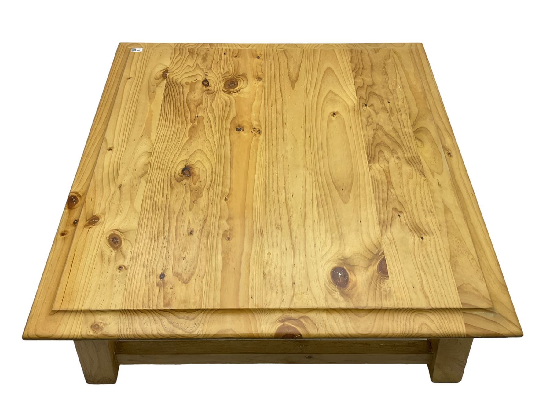 Pine coffee table, moulded top square top raised on splayed supports united by box stretchers 