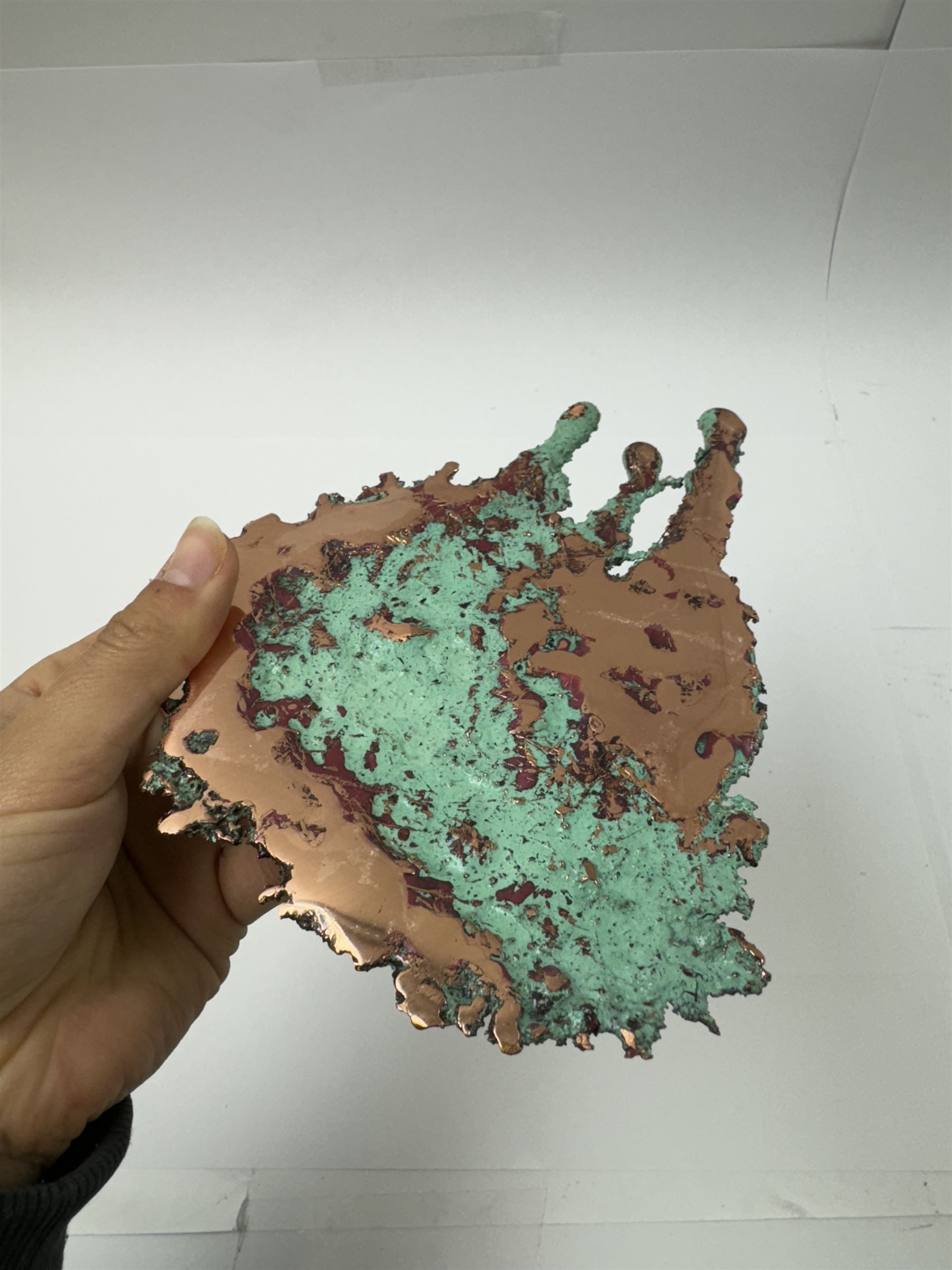 Free form copper splash, with green patina and polished copper accents, L18cm, W14cm