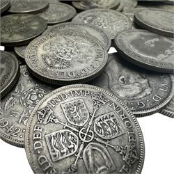 Approximately 565 grams of Great British pre 1947 silver one florin or two shillings coins