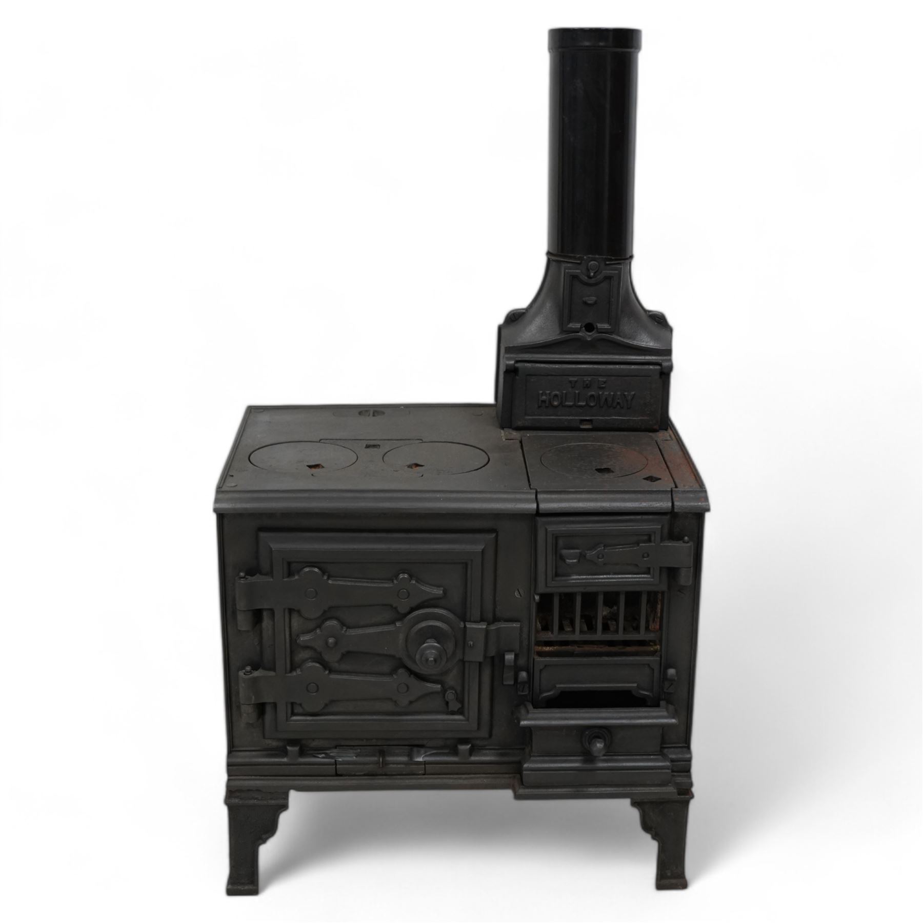 'The Holloway' cast iron portable range stove, fitted with surface burners and oven, on angular bracket feet 