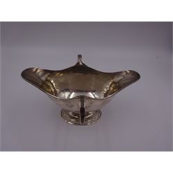 Edwardian silver twin handled pedestal dish, of navette shaped form, with twin loop handles, upon a stepped oval pedestal, hallmarked William Neale, Birmingham 1907, H9cm