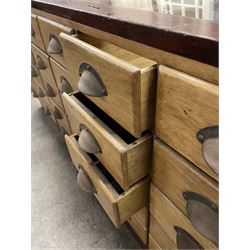 20th century mahogany and glazed haberdashery shop's display cabinet, fitted with thirty-five small drawers, on skirted base  - THIS LOT IS TO BE COLLECTED BY APPOINTMENT FROM THE OLD BUFFER DEPOT, MELBOURNE PLACE, SOWERBY, THIRSK, YO7 1QY