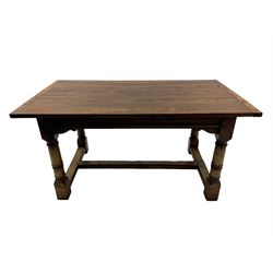 Oak refectory dining table, rectangular three plank top with cleated ends, two additional leaves, on turned supports united by H-stretchers 