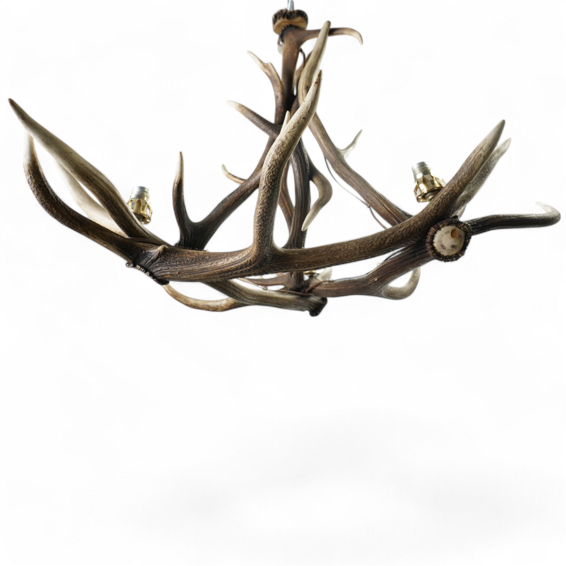 Deer antler chandelier, of triangular form, with three fitted lights H62cm