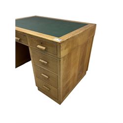 Early to mid-20th century oak pedestal desk, rectangular top with inset writing surface, fitted with five drawers 