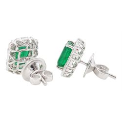 Pair of 18ct white gold emerald cut emerald, round brilliant and baguette cut diamond stud earrings, total emerald weight approx 2.25 carat, total diamond weight approx 0.70 carat