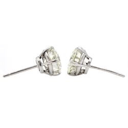 Pair of platinum round brilliant cut diamond stud earrings, Birmingham 1981, total diamond weight 5.00 carat, VS1-VS2 clarity, colour K, with World Gemological Institute certificate
