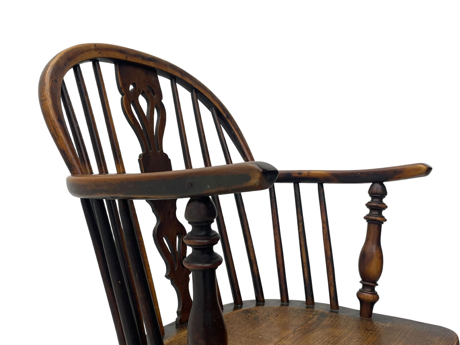 19th century yew wood and elm Windsor armchair, low double hoop stick and pierced splat back, dished seat on turned supports united by crinoline stretchers