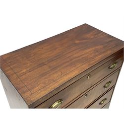 George III mahogany chest, rectangular ebony strung top, fitted with three graduating cock-beaded drawers with oval pressed brass handle plates and demi-lune handles, on tall bracket feet 