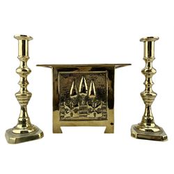 Arts and Crafts square brass planter, probably Glasgow School, with a raised pattern of stylised trees and foliage 23cm x 19cm and pair of brass candlesticks H25cm (3)