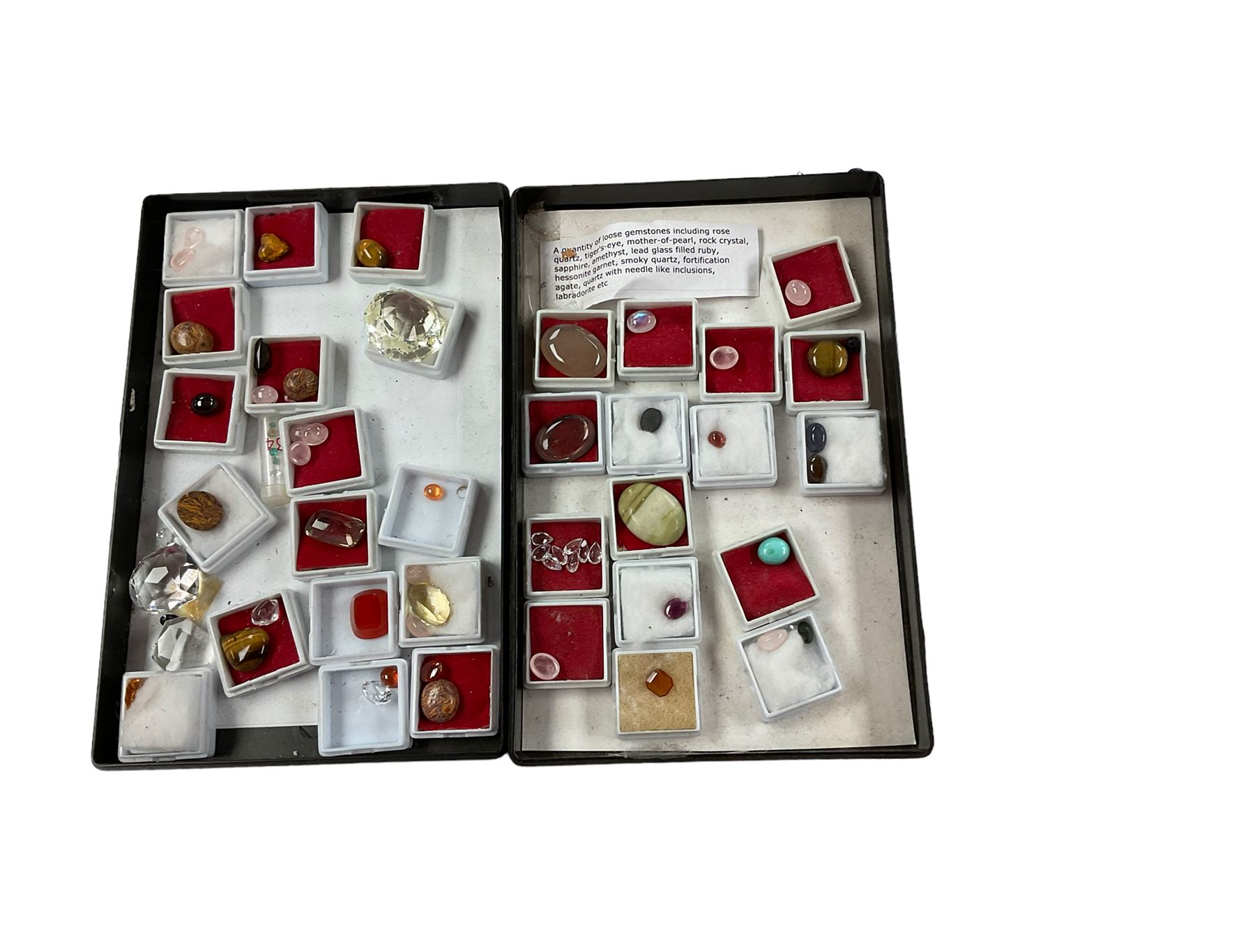 Collection of precious stones including tigers eye, rose quartz, moonstone etc  