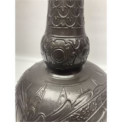 Burmantoft vase with slender neck, tubeline decoration on a brown ground, with impressed mark beneath, H38cm