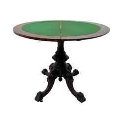 Victorian walnut demi-lune card table, circular fold-over top with foliate carved edge, revealing green baize-lined playing surface over scalloped apron, raised on a turned and carved pedestal with four splayed scroll supports with castors