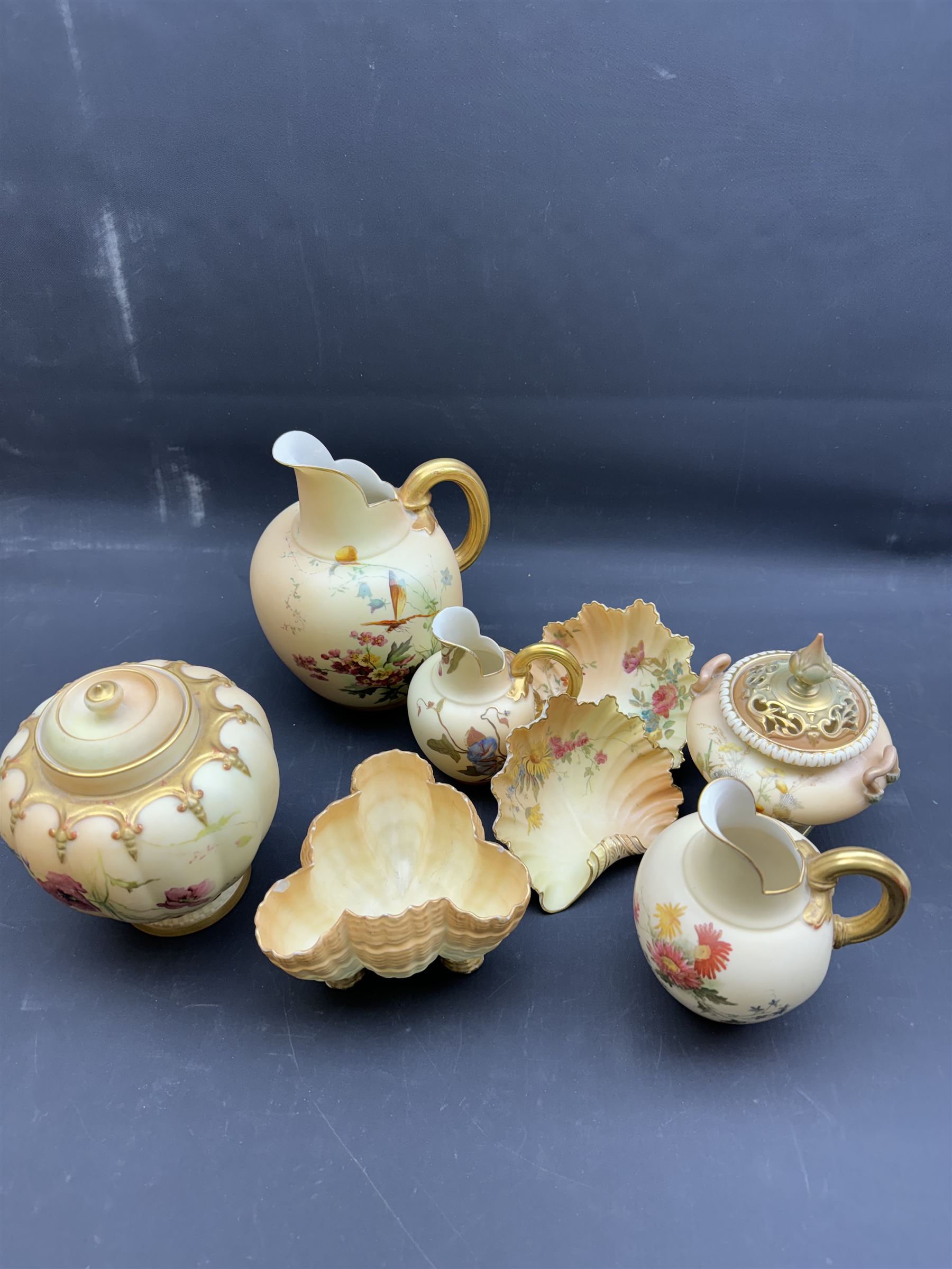 Royal Worcester Blush Ivory, three graduation flat back jugs, bowl in the form of a shell, covered jar etc (8)