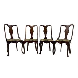 Set of eight late 19th century mahogany spoon back dining chairs, each with shaped top rail over Queen Anne design vase-shaped splat, upholstered seats in floral patterned fabric, raised on cabriole supports with scroll carved knees