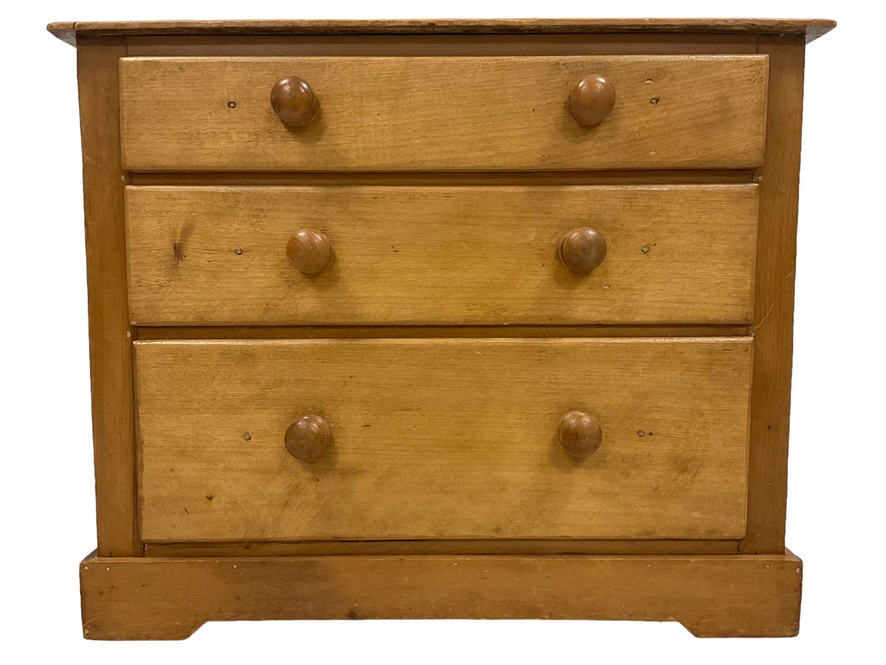 Victorian pine and satinwood chest, fitted with three graduating drawers, on skirted base with castors