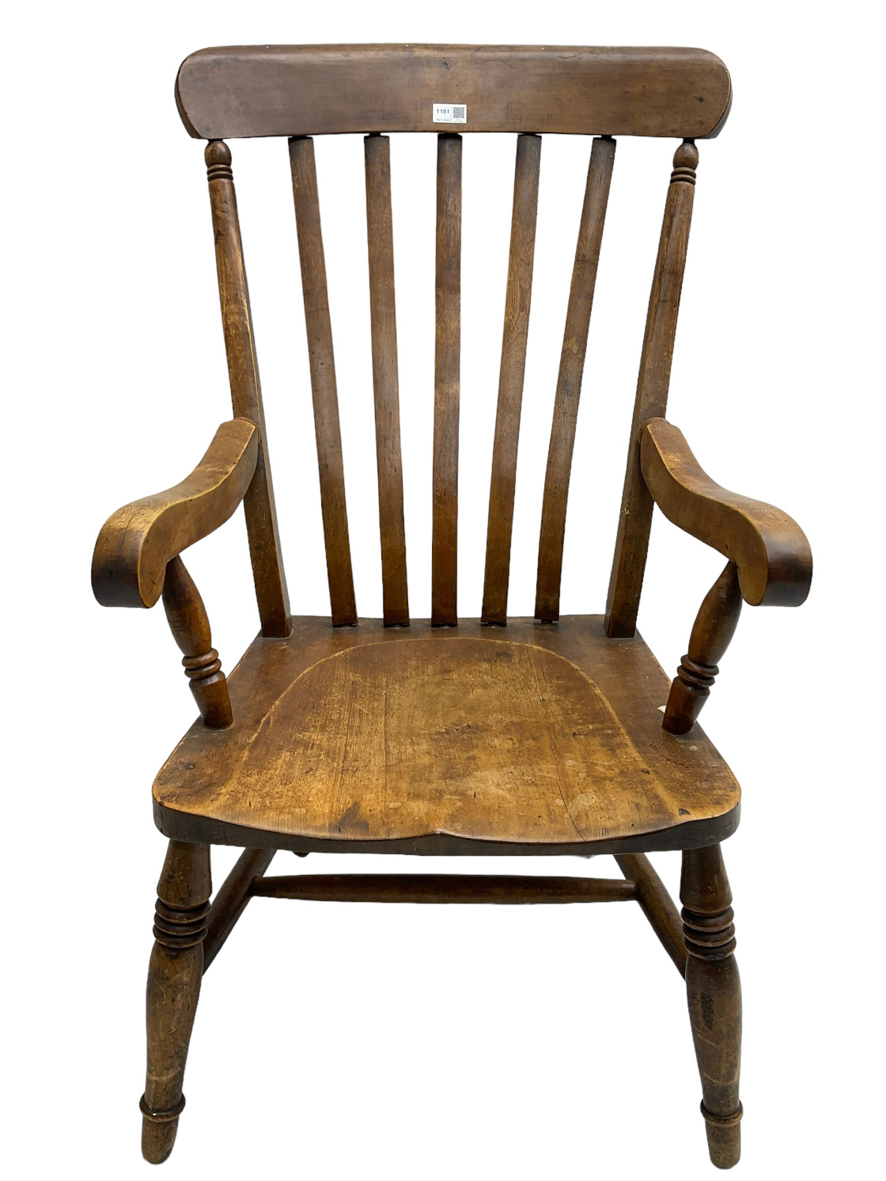 19th century beech Farmhouse armchair, shaped cresting rail over vertical slat back, dished seat on turned supports united by H stretcher 