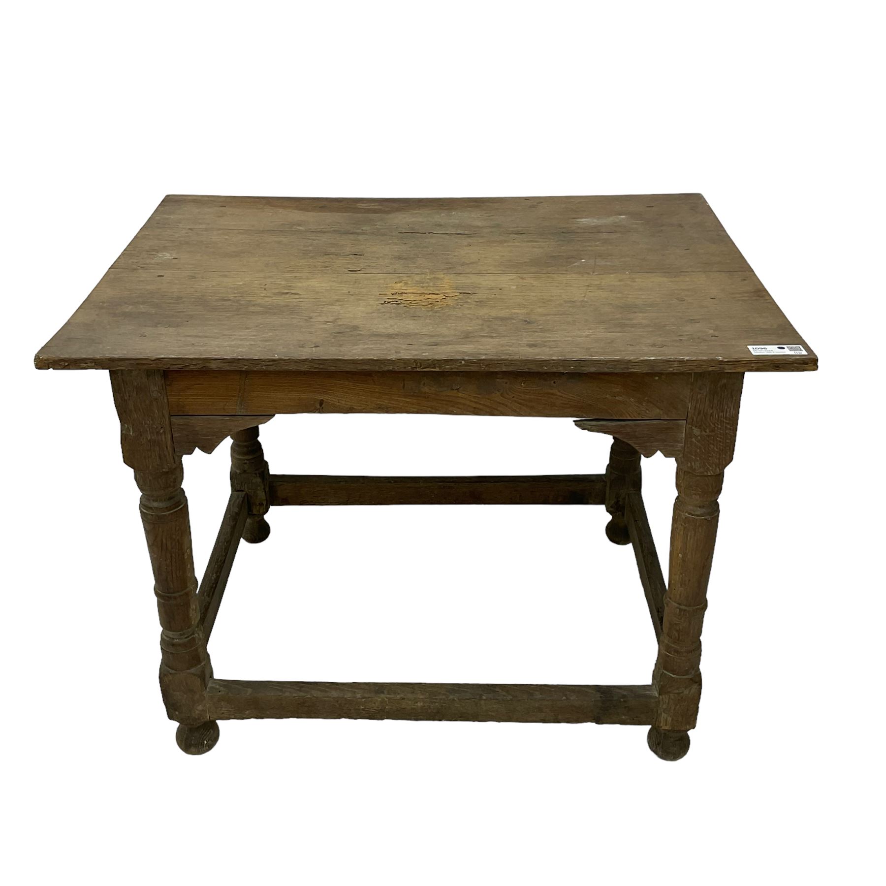 18th century oak joined table, rectangular pegged plank top on turned supports united by plain stretchers