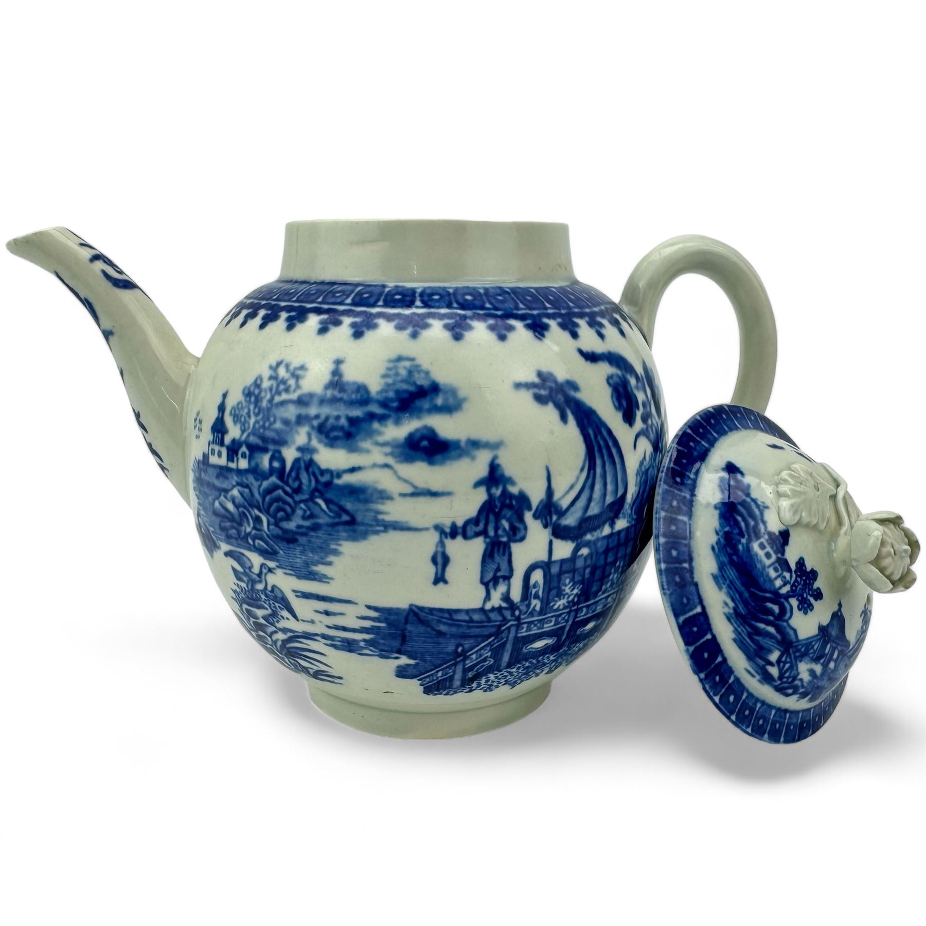 Two First Period Worcester porcelain globular form teapots, decorated in the Fisherman pattern and the other decorated with flowes and butterflies, both with flower knop handles and crescent marks beneath, H16cm (2)