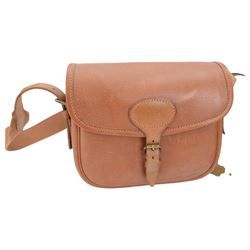 Brady brown leather cartridge bag on a canvas strap, together with another cartridge bog with a Croots leather and canvas strap