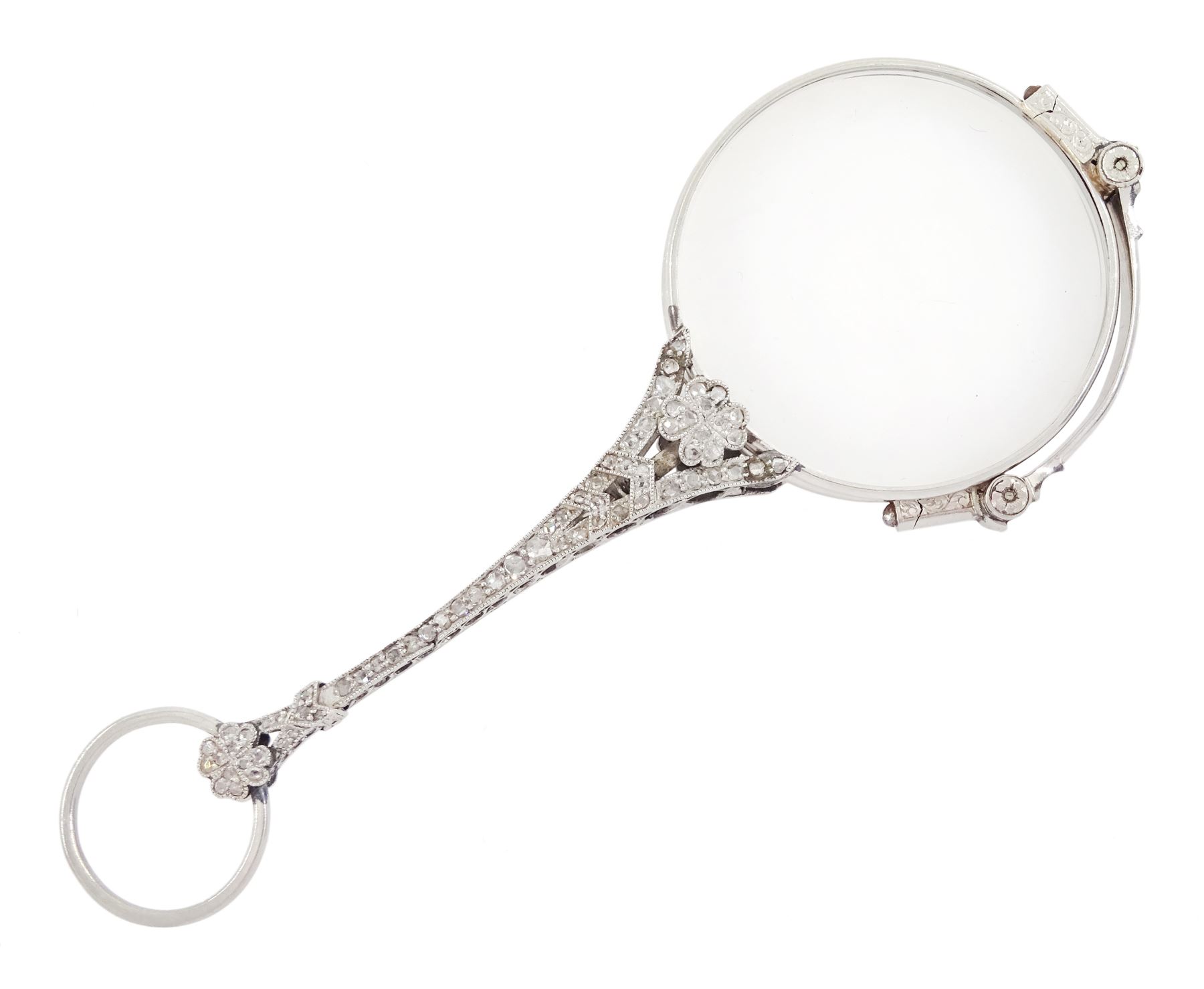 Early 20th century platinum and diamond lorgnette, the milgrain set rose cut diamond handle, with flower head terminals, the reverse with engraved foliate decoration, to spring-loaded glass lenses