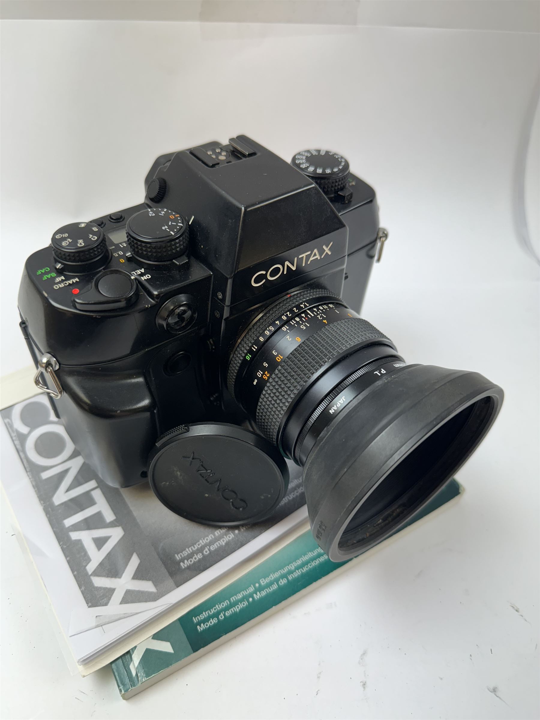 Contax AX SLR camera serial no. 007566, with a Carl Zeiss Planar 1.4/50 T* lens serial no. 7192099, 