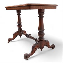 Victorian mahogany stretcher table, moulded rectangular top with rounded corners, on turned twin pillar supports united by turned and carved stretcher, on carved out splayed supports with brass and ceramic castors 