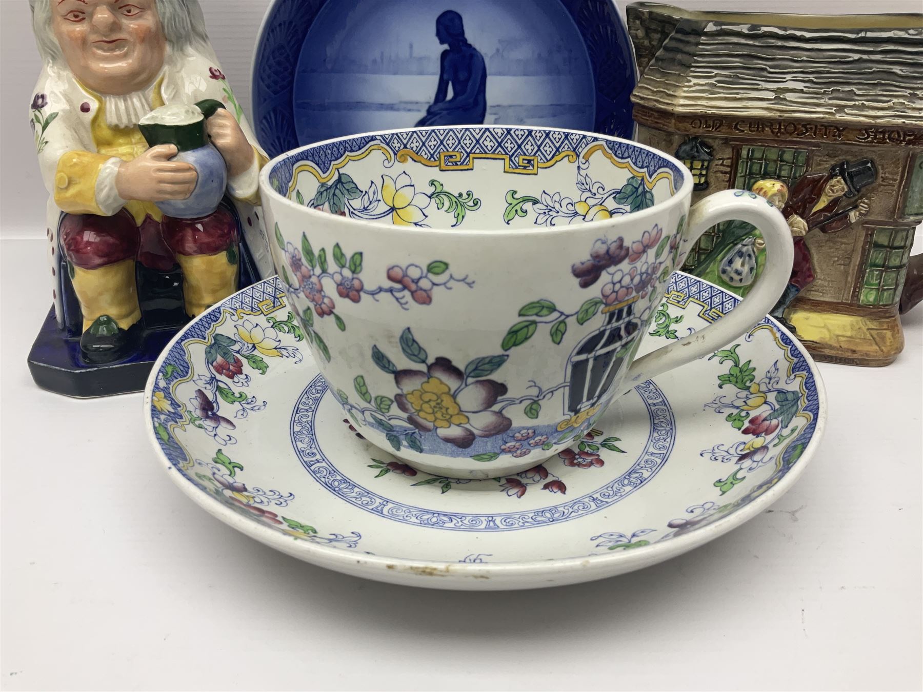 Royal Doulton Old Curiosity Shop jug, toby jug, novelty cup and saucer and Royal Copenhagen 1962 Christmas plate