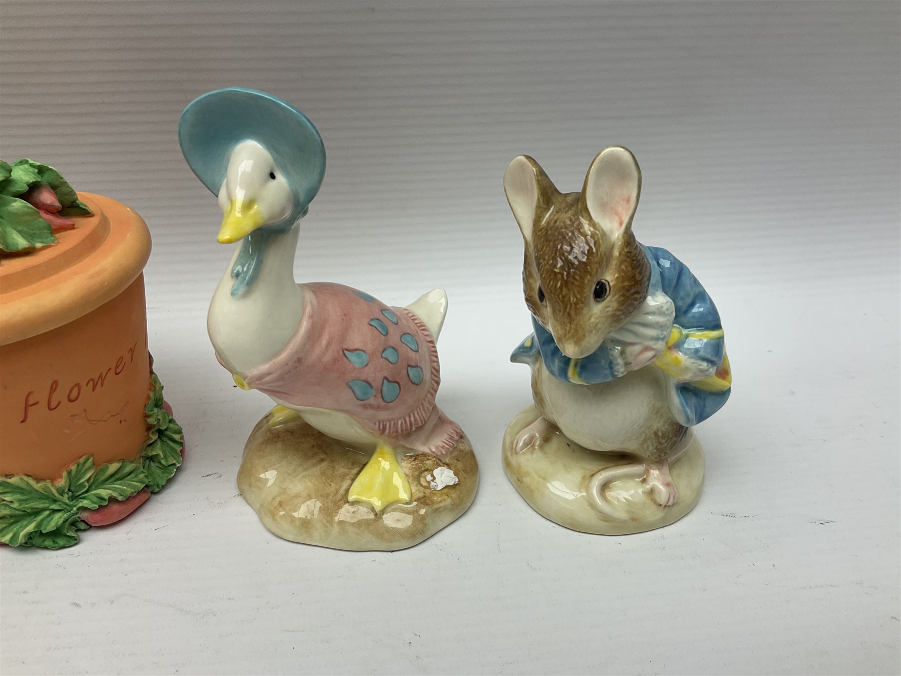 Twelve Border Fine Arts The World of Beatrix Potter and Peter Rabbit Collection figures, including Musical Tailor of Gloucester, Peter Rabbit with Miniature Waterball, Peter Hid in a Flowerpot trinket box, Jemima Puddle Duck with Herbs and Gentleman Mouse, etc